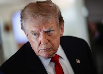 U.S. President Donald Trump speaks to reporters aboard Air Force One en route to Michigan, U.S., July 27, 2026. REUTERS/Evan Vucci